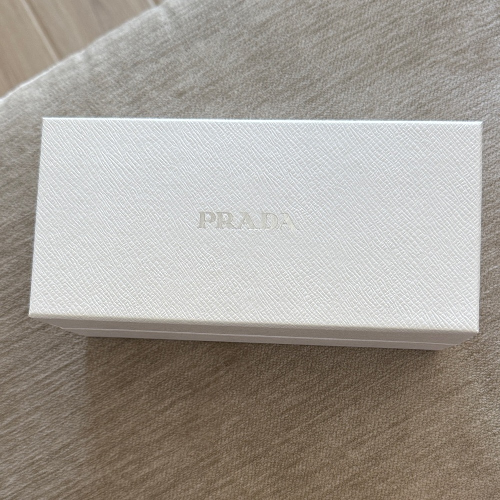Prada Textured White Gift Box
Size: 7.75”x3.75”x3.25”